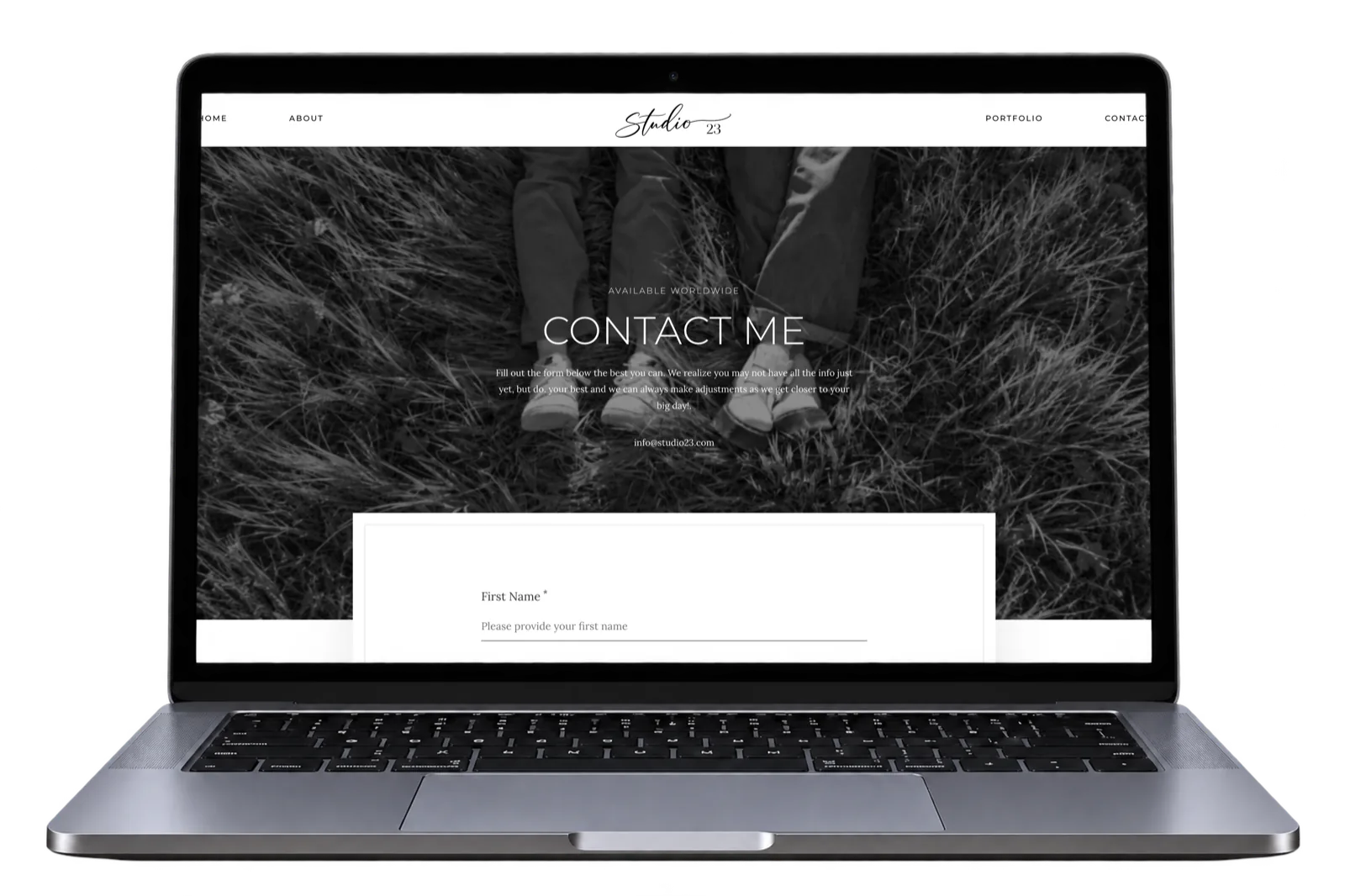 Studio 23 contact page on a laptop